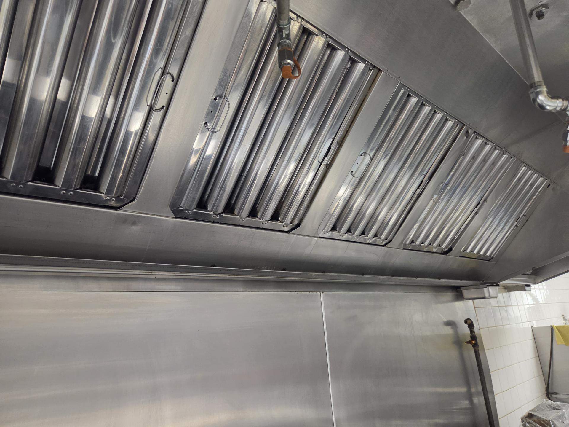 Deep clean results on commercial kitchen exhaust components — grease-free surfaces after Northern Hood service