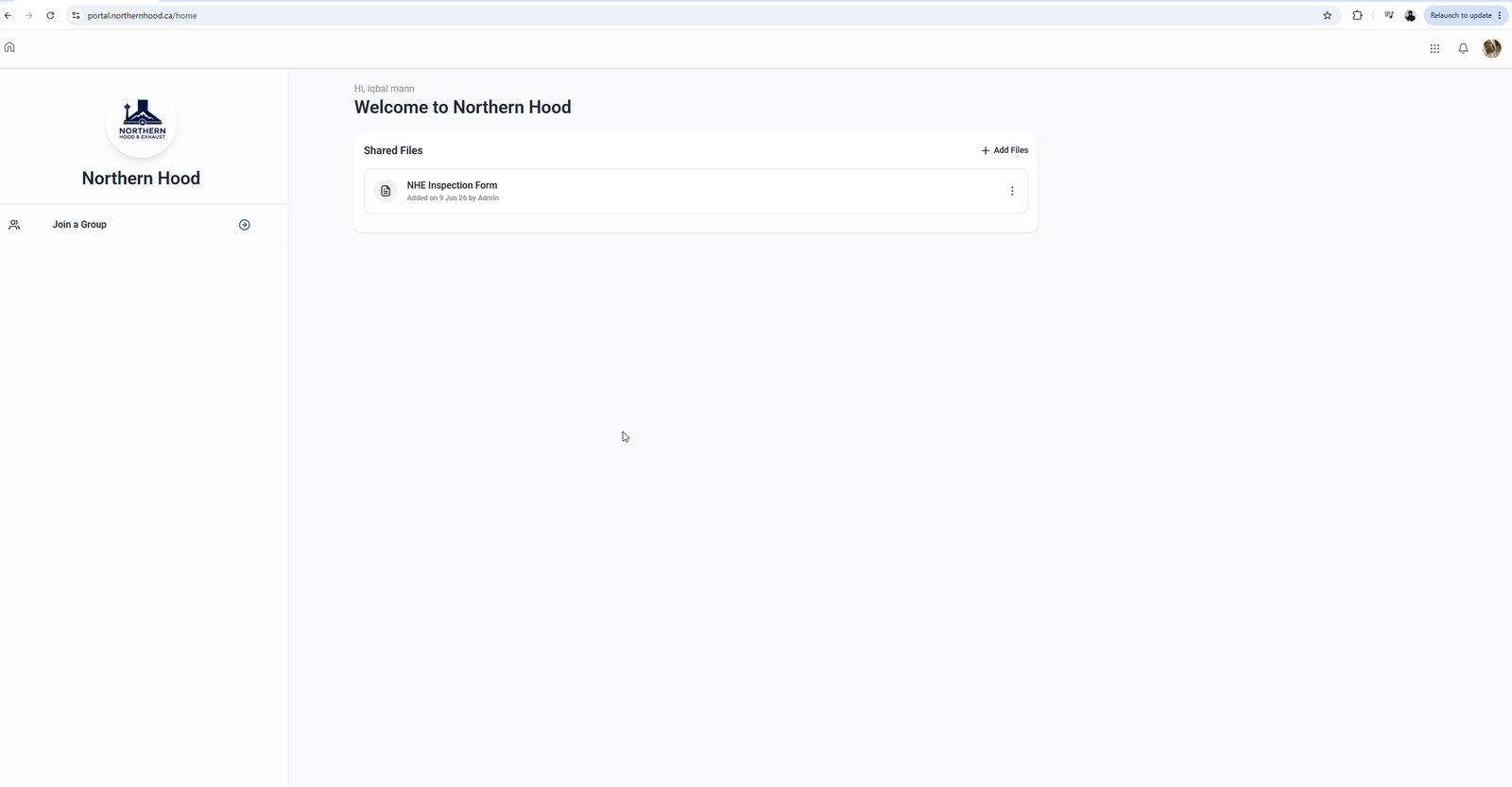 Facility manager reviewing multi-location hood cleaning records in the Northern Hood & Exhaust client portal dashboard