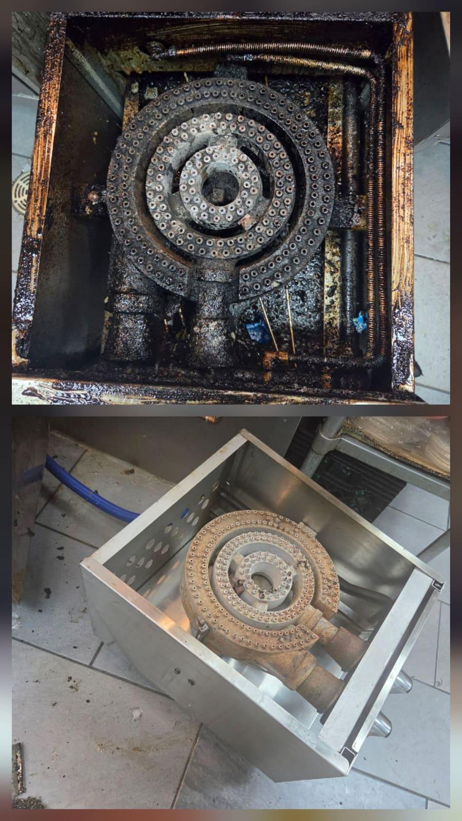 Commercial range burner and burner box in a Calgary kitchen, before and after cleaning: burner ring and box coated in carbonized grease above, box pulled and cleaned to bare stainless below.